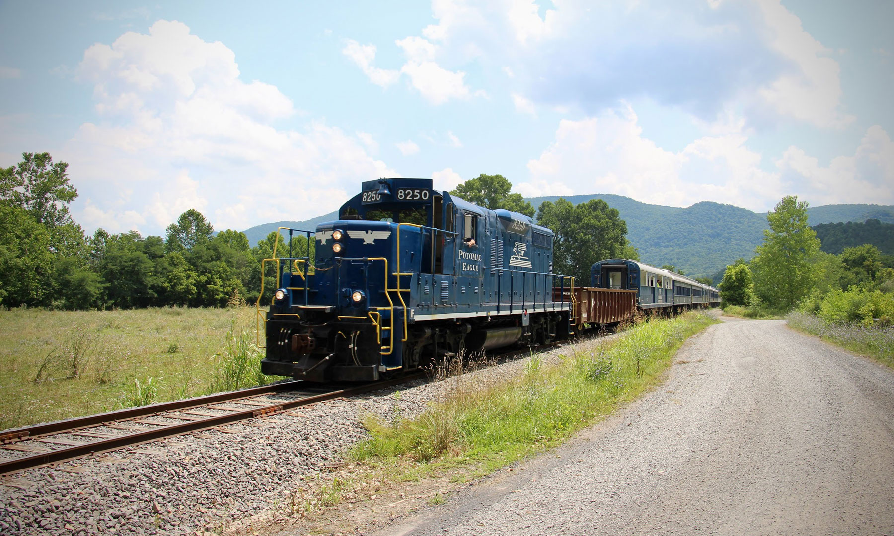 8250 Canadian Pacific number 8250 pulling the train by a gravel road