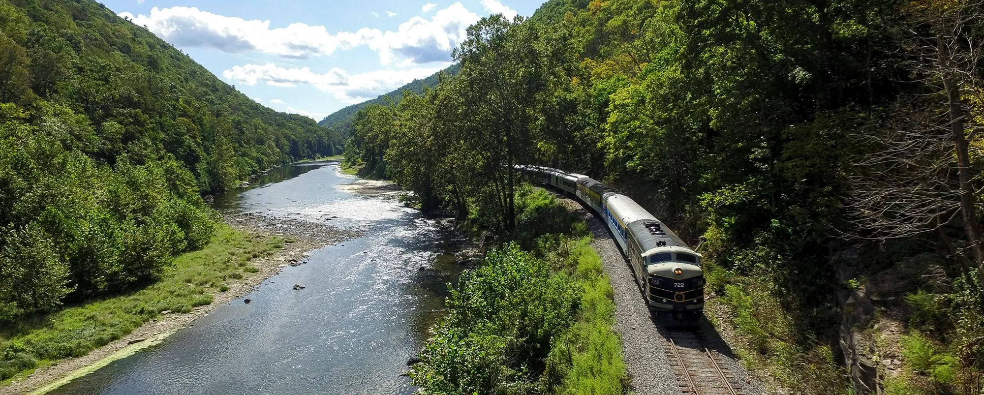 Hampshire-0286-scaled-1 Potomac Eagle train traveling through the Trough Canyon during the summer