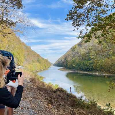 Women taking photos of the Trough Canyon