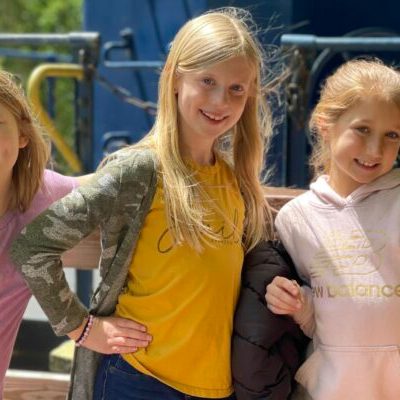 a little girl posing for a picture