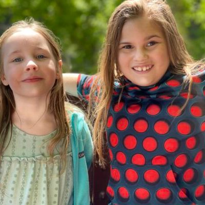 Two little girls on the gondola car