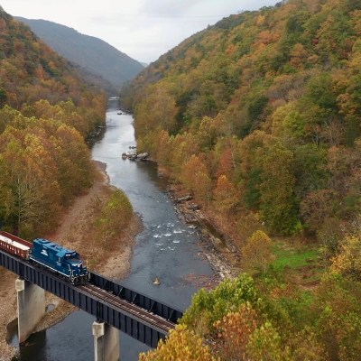 Canadian Pacific number 8250 pulling the train across the sycamore bridge in the fall